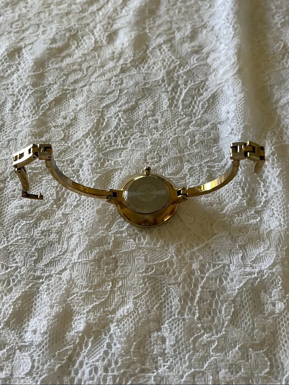 Anne Klein Gold Tone Bangle Watch with Black Dial and Gold Markers